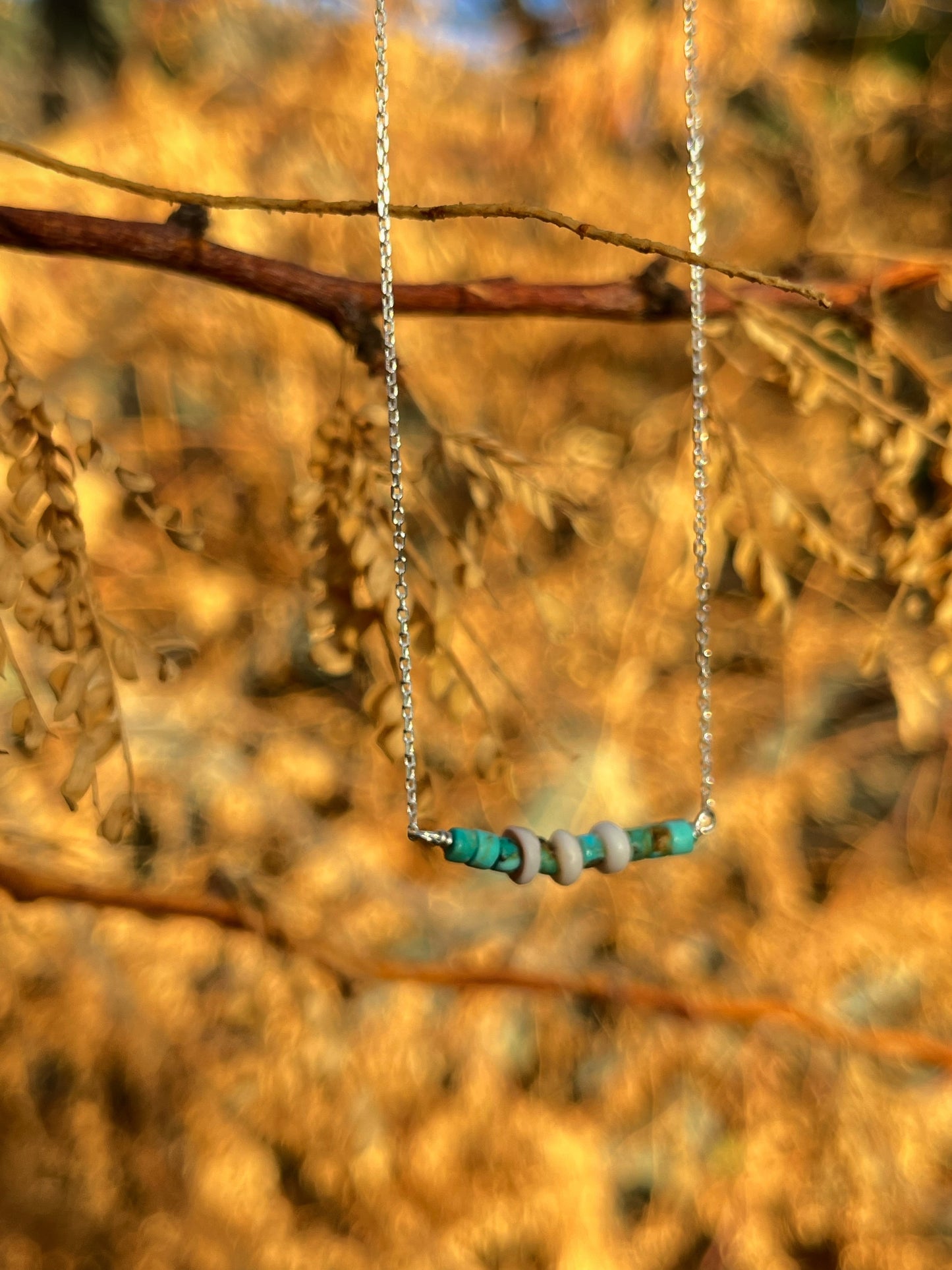 The Merchant Necklace in puka shell or herkimer diamond
