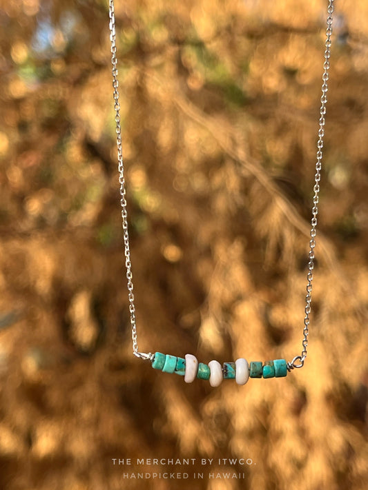 The Merchant Necklace in puka shell