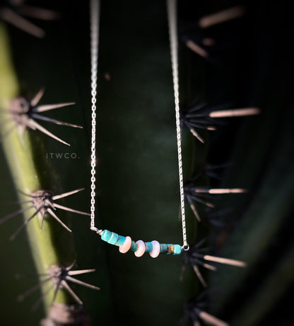 The Merchant Necklace in puka shell or herkimer diamond